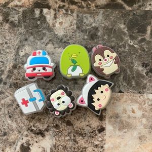 Crocs jibbits glow in dark